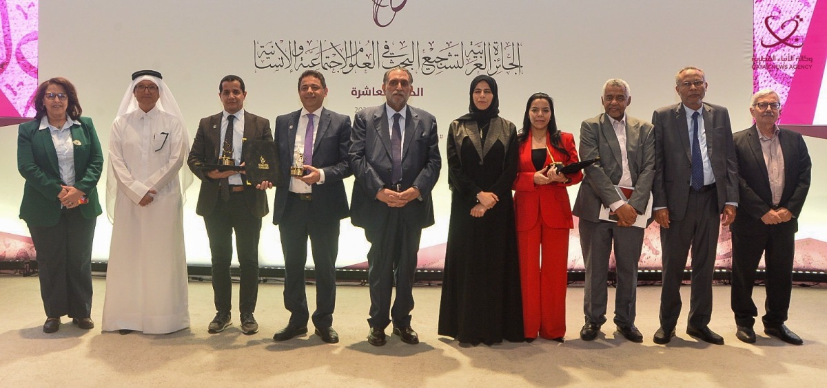 Minister of Education and Higher Education H E Lolwah bint Rashid Al Khater with officials and winners at the awards ceremony. 