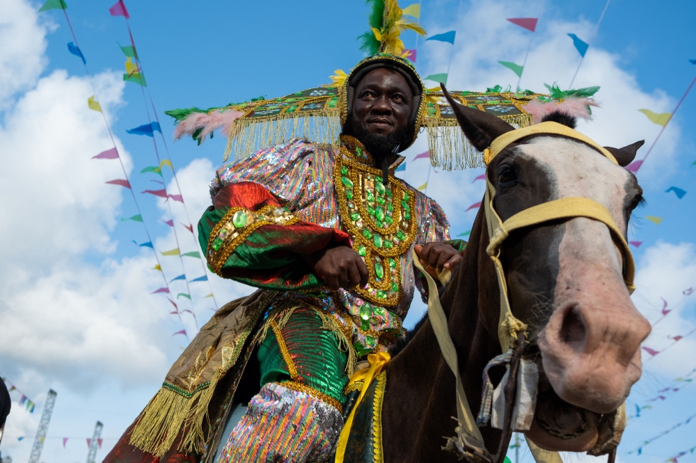 Participants parade during the Lagos Fanti Carnival, in Lagos on April 20, 2025. (Photo by Toyin Adedokun / AFP)