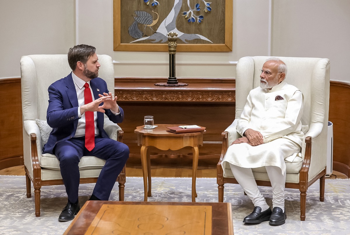 In this handout photograph taken on April 21, 2025 and released by the Indian Press Information Bureau (PIB), India’s Prime Minister Narendra Modi (R) speaks with US Vice President JD Vance, during their meeting in New Delhi. (Photo by PIB / AFP)