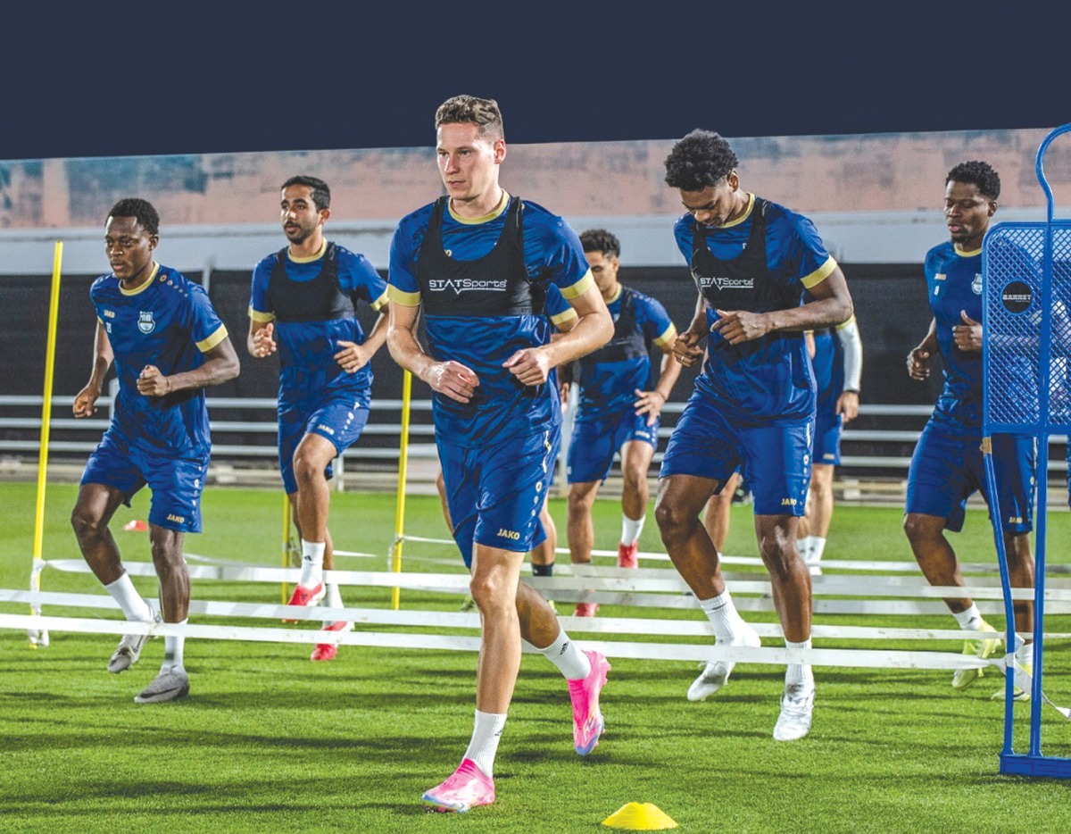 Al Ahli players during a training session yesterday.