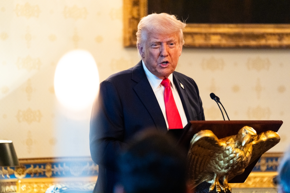 President Donald Trump delivers remarks during an Easter prayer service and dinner at the White House on Sunday, April 20, 2025. (Photo by Demetrius Freeman/The Washington Post)