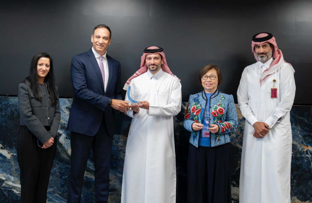 Commercial Bank officials receiving the award.