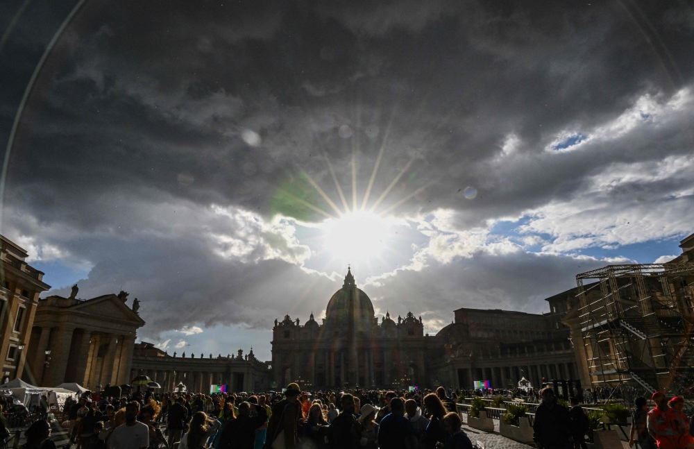 This photograph shows a view of St Peter's Basilica of The Vatican where the late Pope lies in state, taken from Rome on April 24, 2025.  (Photo by Alberto Pizzoli / AFP)