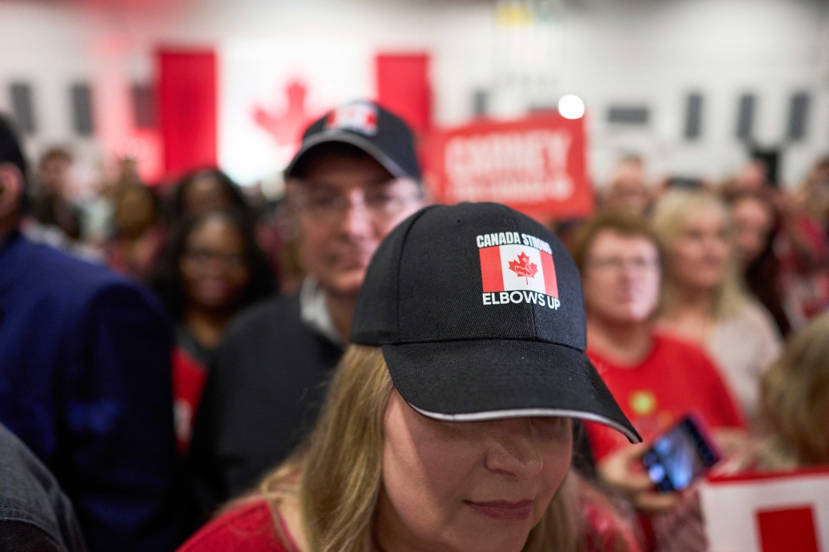 A woman in a hat reading 