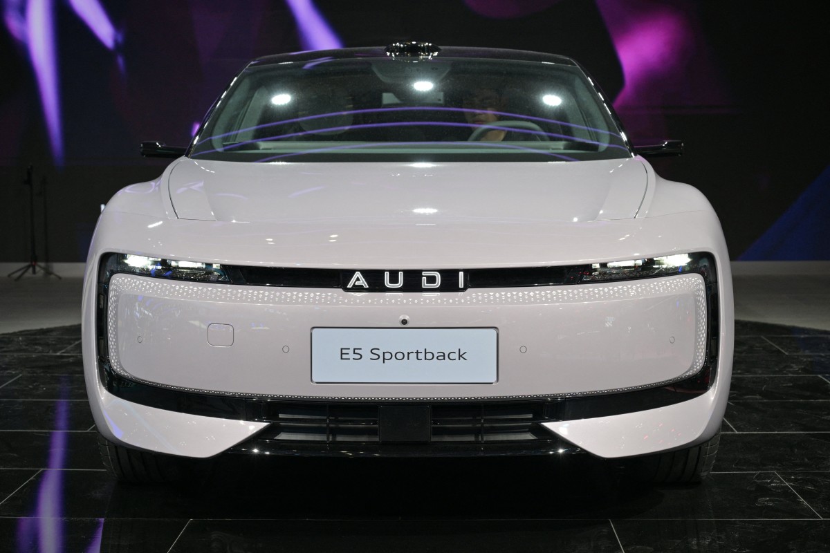 A Audi E5 Sportback car is displayed during the 21st Shanghai International Automobile Industry Exhibition at the National Exhibition and Convention Center in Shanghai on April 25, 2025. (Photo by Hector Retamal / AFP)
