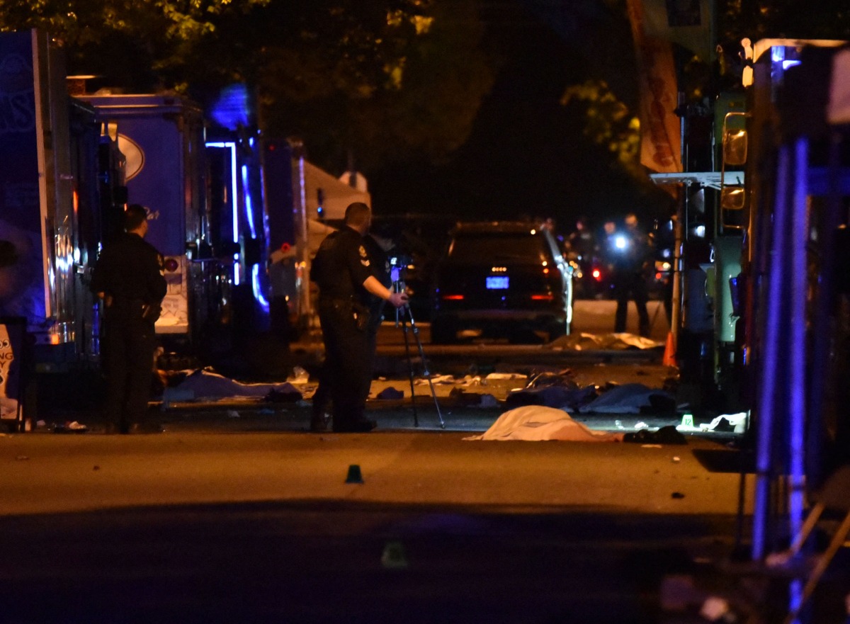 Vancouver police investigate a crime scene after a man drove into pedestrians at the annual Lapu Lapu festival celebrating Filipino culture, at East 43rd Avenue and Fraser, in the south of Vancouver on April 26, 2025. Photo by Don MacKinnon / AFP.
