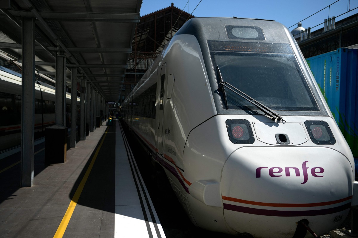 A train of the Spanish state-owned rail company Renfe, is pictured at the Principe Pio train station in Madrid, on September 5, 2019. Photo by GABRIEL BOUYS / AFP