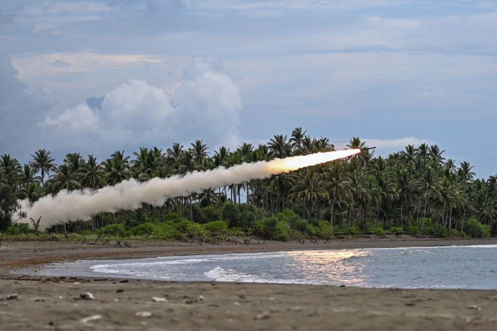 A High Mobility Artillery Rocket System (HIMARS) projectile is launched as part of a counter-landing live fire exercise during the annual US-Philippines joint military 