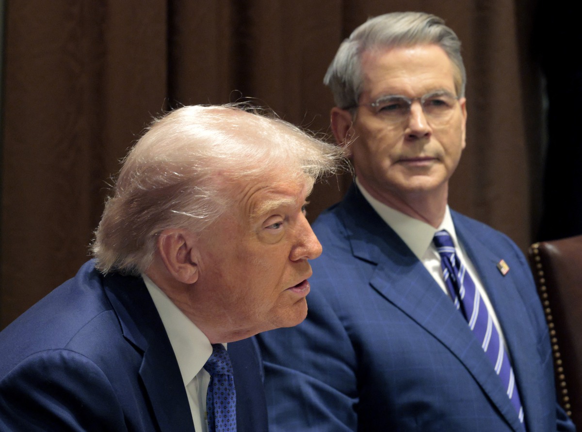 US Treasury Secretary Scott Bessent listens as US President Donald Trump delivers remarks during a bilateral lunch with Norway's Prime Minister Jonas Gahr Store in the Cabinet Room at the White House on April 24, 2025 in Washington, DC. (Photo by CHIP SOMODEVILLA / GETTY IMAGES NORTH AMERICA / Getty Images via AFP)
