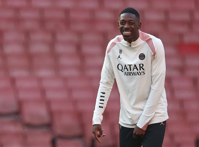 Paris Saint-Germain's French forward #10 Ousmane Dembele smiles during a training session at the Emirates Stadium in London, on April 28, 2025, on the eve of their UEFA Champions League semi-final first leg football match against Arsenal. (Photo by Franck Fife / AFP)