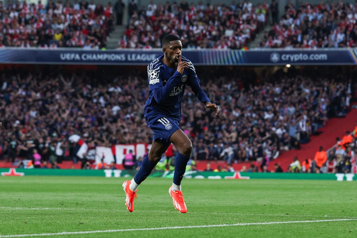 Paris Saint-Germain's French forward #10 Ousmane Dembele celebrates after scoring his team first goal during the UEFA Champions League Semi-final First Leg football match between Arsenal and Paris Saint-Germain (PSG) at the Emirates Stadium in north London, on April 29, 2025. (Photo by Adrian Dennis / AFP)
