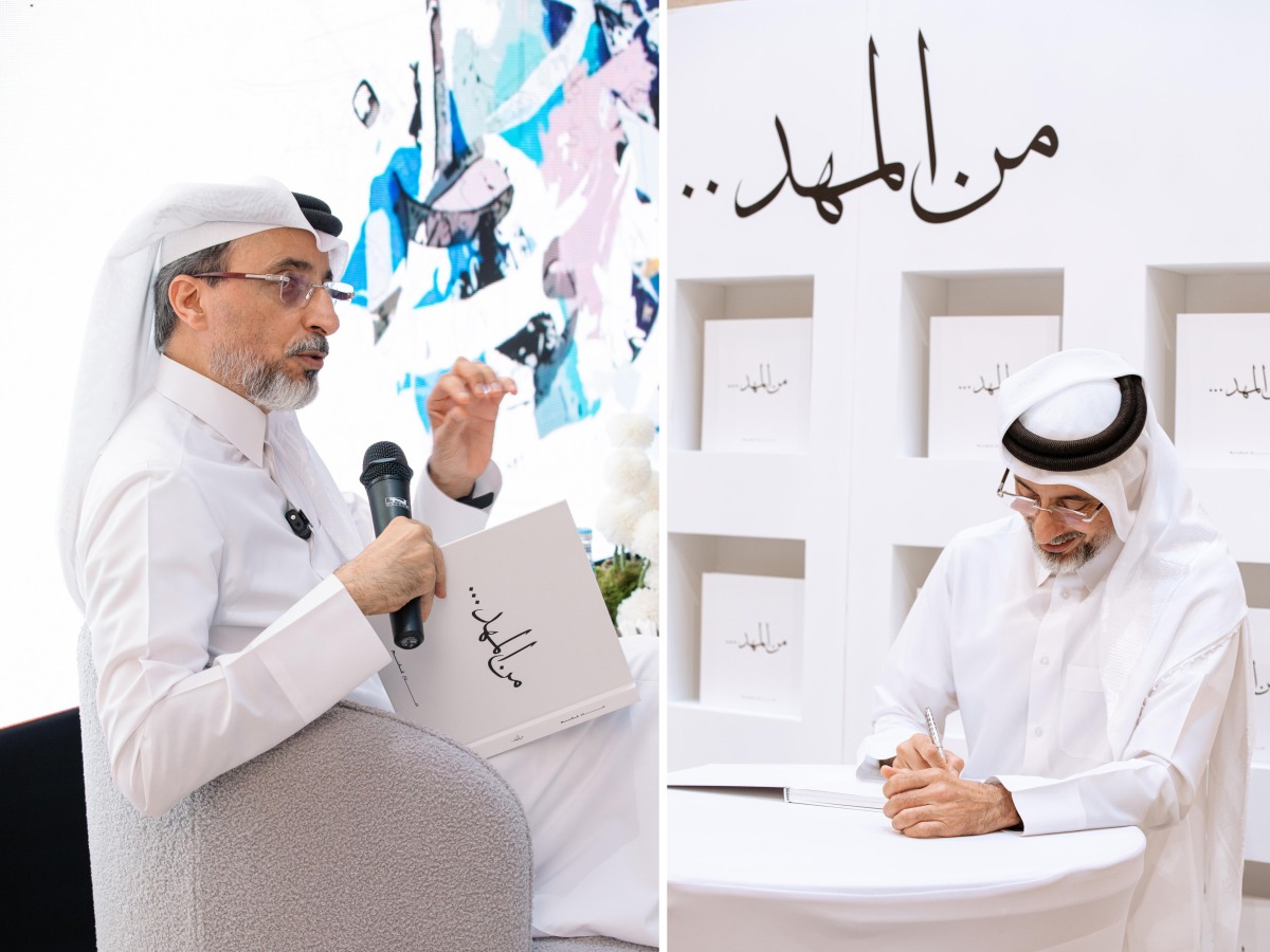 Former Minister of Sports and Youth H E Salah bin Ghanim Al Ali signing a copy of his book.