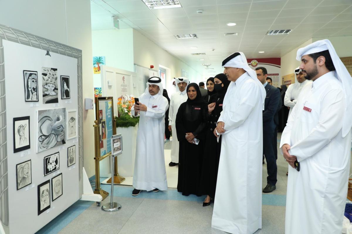 Speaker of Shura Council H E Hassan bin Abdullah Al Ghanim with other officials during the event.