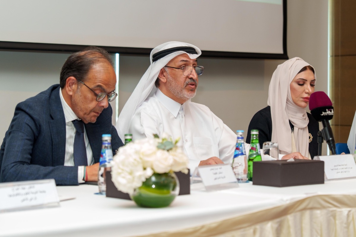 Officials at a press conference to announce the book launch.