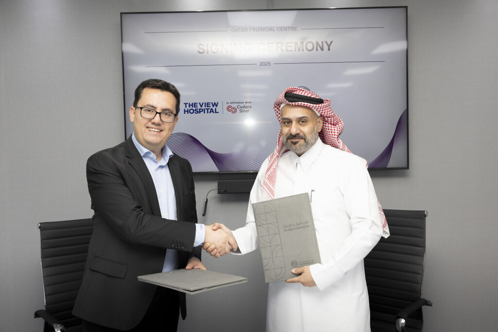 QFC CEO Youssef Mohammed Al-Jaidah and CEO of The View Hospital Dr. Fatih Mehmet Gul during the signing ceremony.