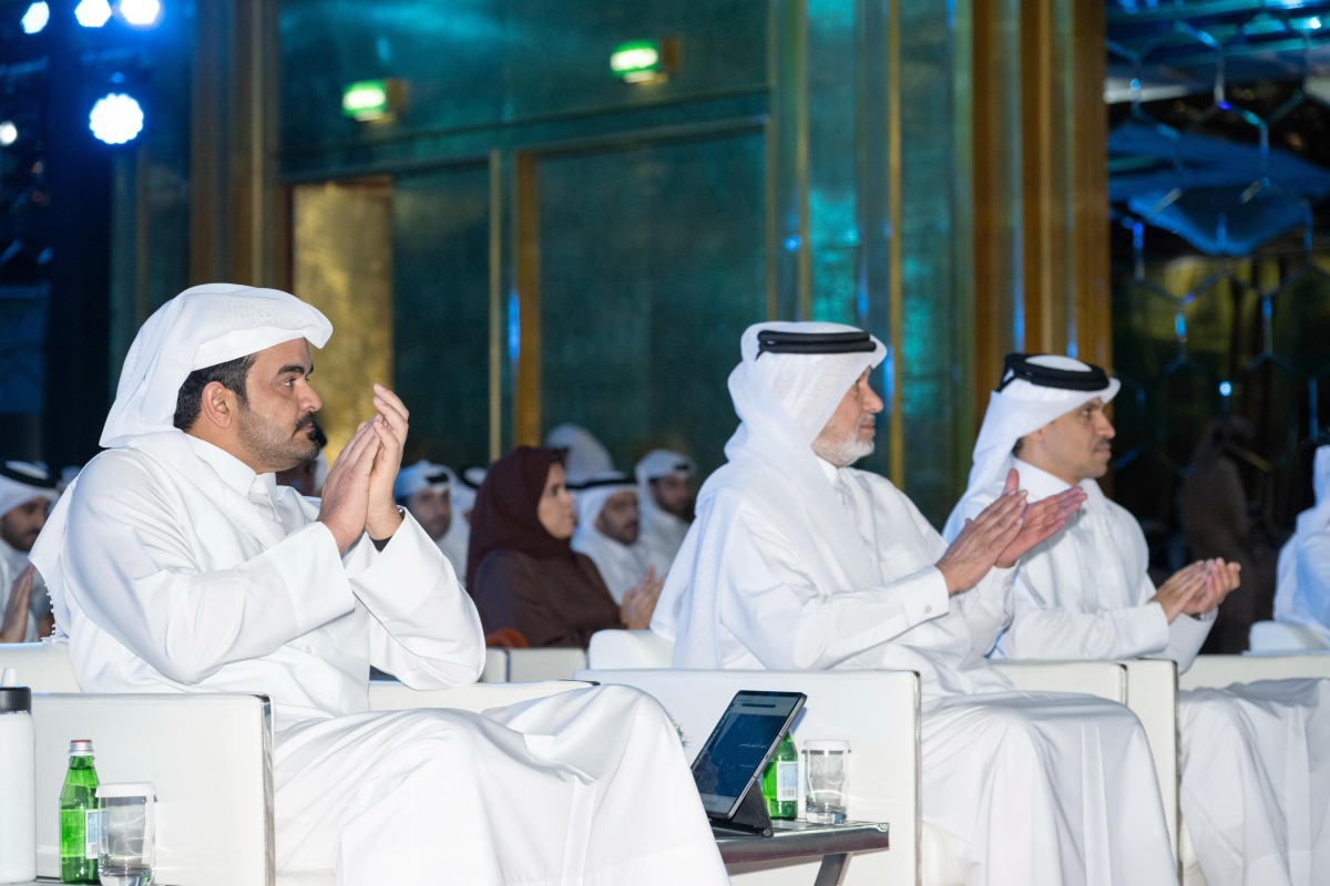 QOC President H E Sheikh Joaan bin Hamad Al-Thani, First Vice President Mohammed bin Yousef Al Mana and Secretary General Jassim bin Rashid Al Buenain applaud during the ceremony.