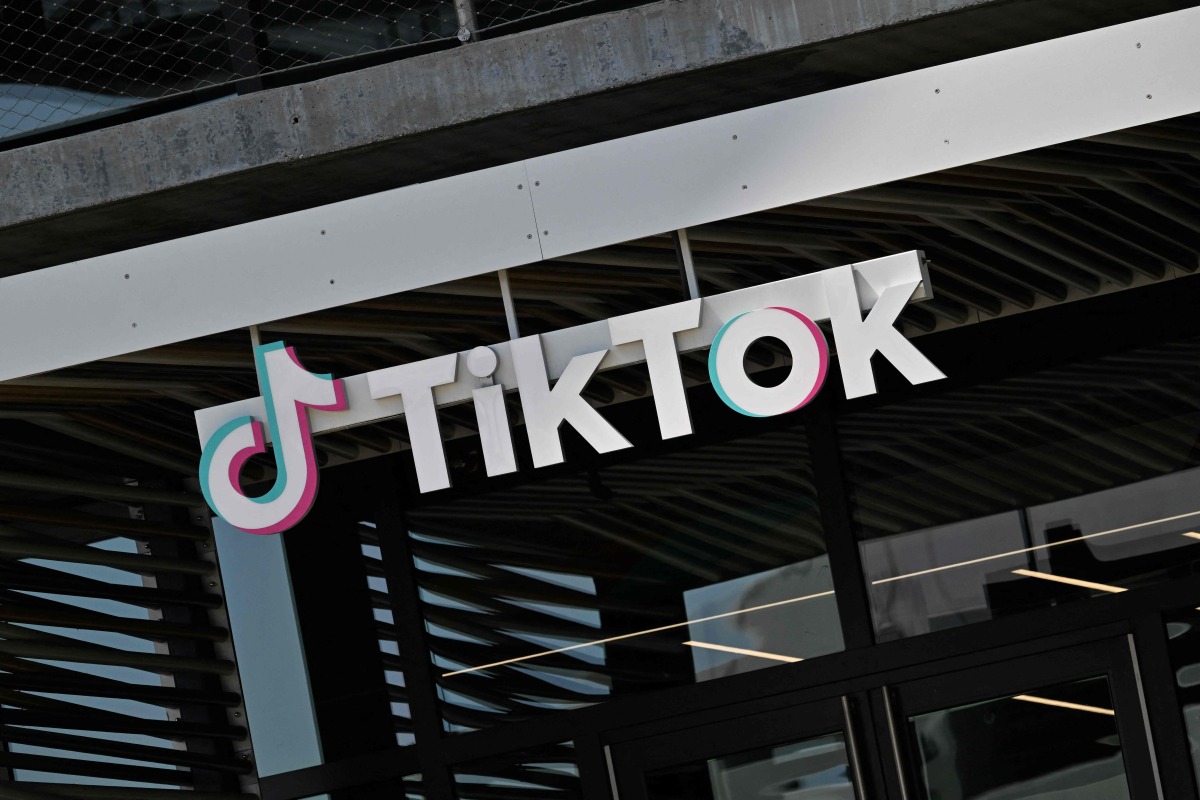 The TikTok logo is seen outside the Chinese video app compan's Los Angeles offices in Culver City, California, on April 4, 2025. Photo by Robyn Beck / AFP