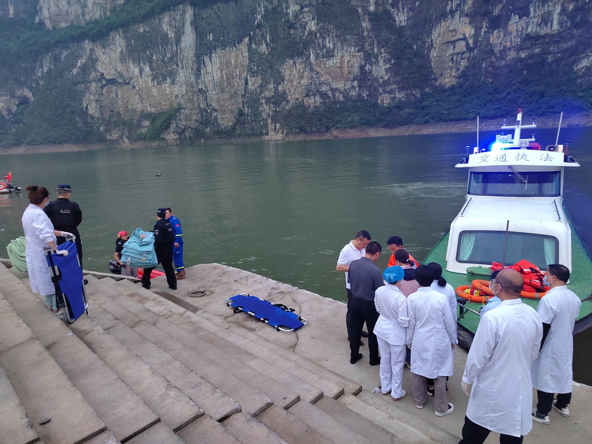 People carry out search and rescue operation at the site where two passenger boats capsized in Qianxi City, southwest China's Guizhou Province, May 4, 2025. Xinhua