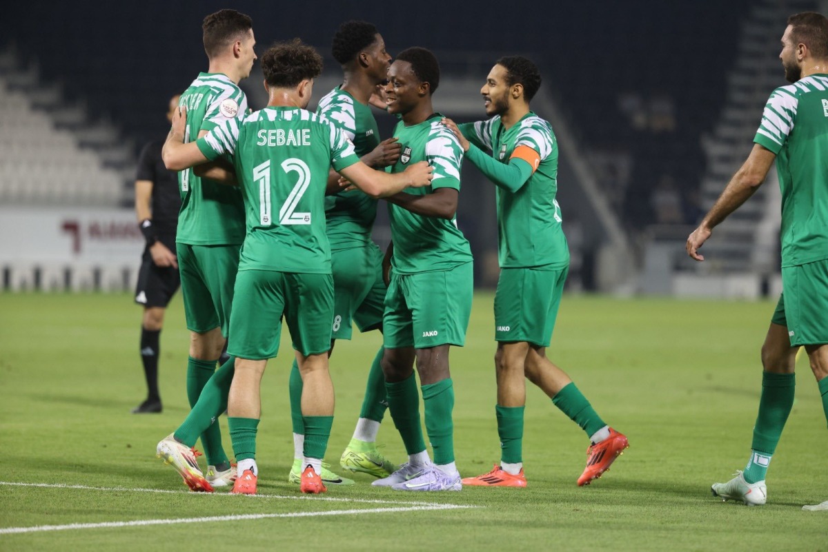 Al Ahli’s Abdulrasheed Umaru (second right) celebrates with teammates after netting the extra-time winner against Qatar SC in the Amir Cup Round of 16 yesterday. 