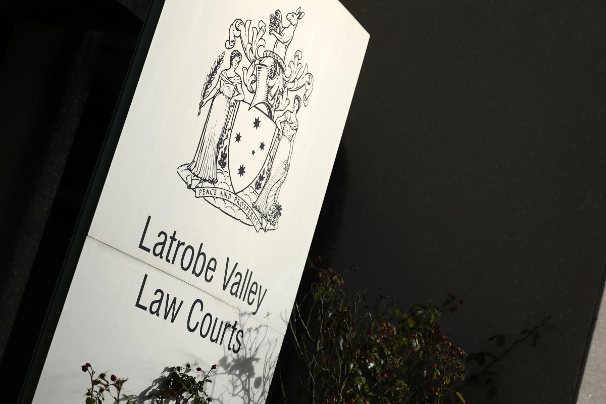 The Victorian Coat of Arms is seen outside the Latrobe Valley Magistrates' Court in Morwell, south of Melbourne, on April 30, 2025. Photo by Martin KEEP / AFP.
