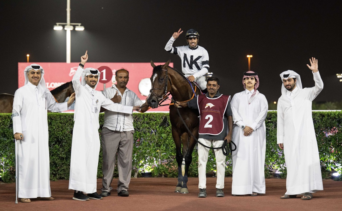 The connections of Billboard Star celebrate their win. PIC: Juhaim/QREC