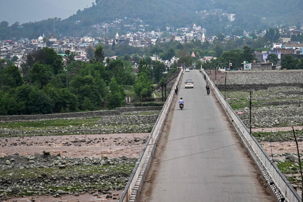 A general view of a partially deserted bridge leading to the Indian-run main town of Poonch on May 8, 2025. (Photo by Punit Paranjpe / AFP)
 