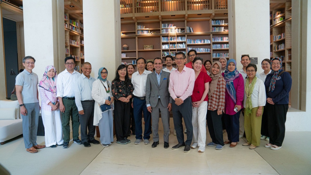 Diplomats and representatives from ASEAN member states with General Manager at Zulal Wellness Resort, Ammar Samad, in a group photo at the event. 