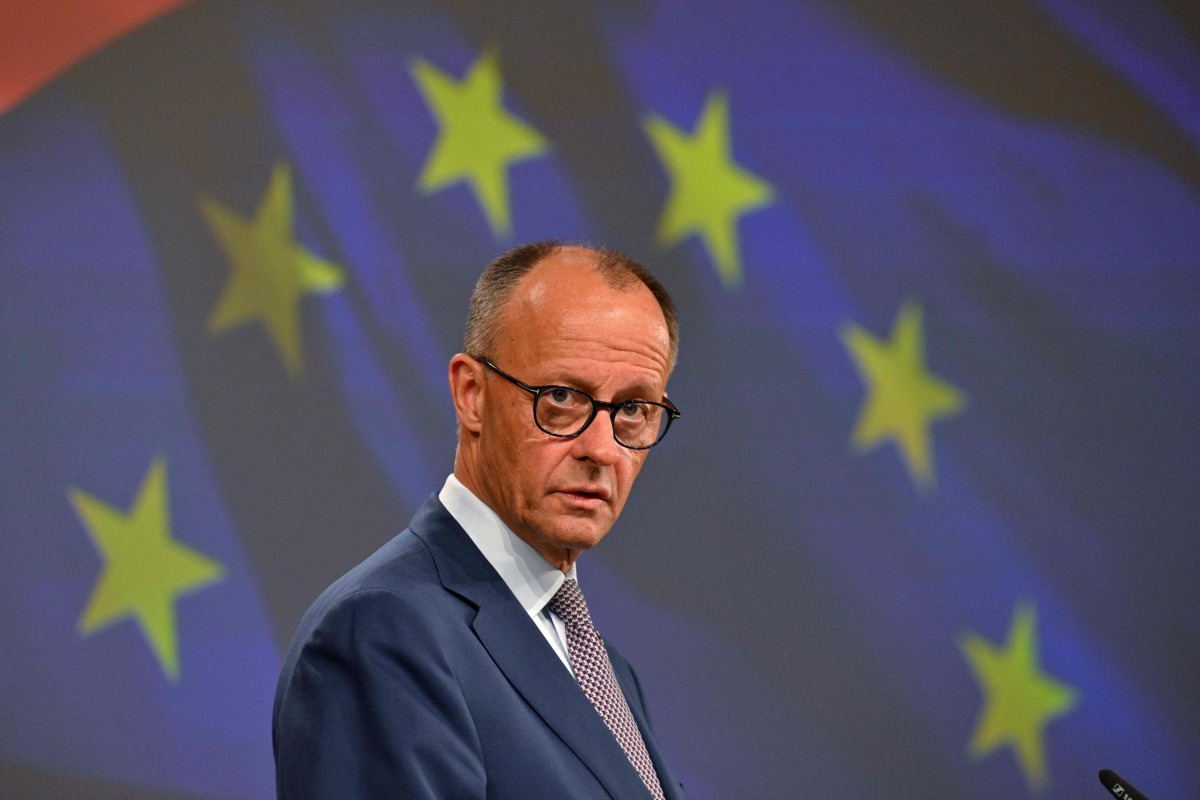 German Chancellor Friedrich Merz gives a joint press conference with the European Commission president at the EU headquarters in Brussels on May 9, 2025. (Photo by Nicolas TUCAT / AFP)