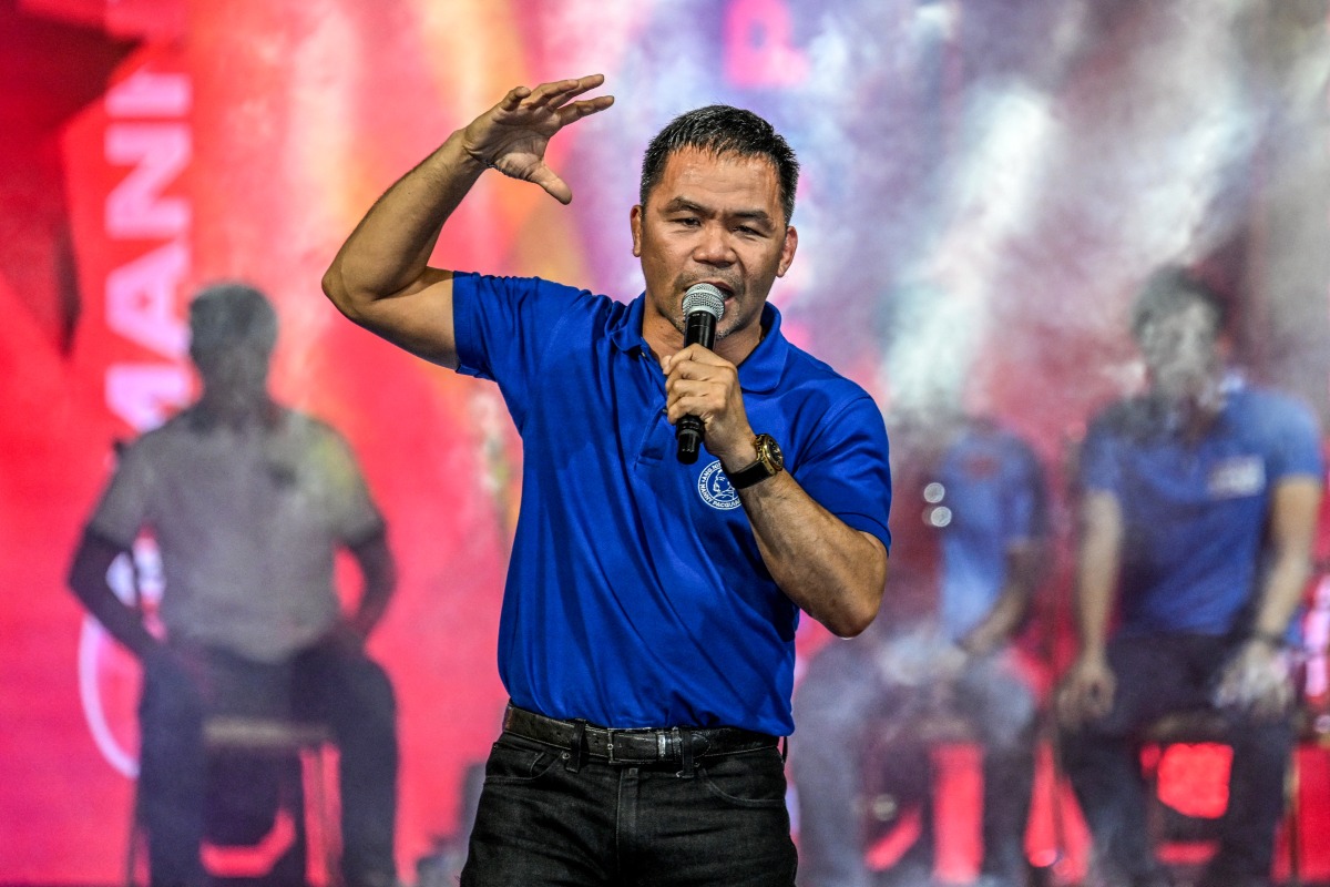 Photo used for representational purposes. Philippine senatorial candidate Manny Pacquiao attends the campaign rally of senatorial candidates under the party of the Philippines' president Ferdinand Marcos Jr in Mandaluyong, Metro Manila, on May 9, 2025, ahead of the midterm elections. Photo by Jam STA ROSA / AFP.