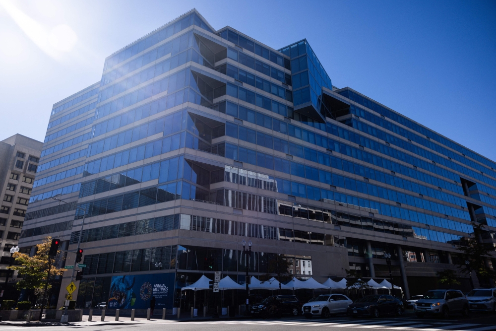A view of the International Monetary Fund (IMF) headquarters building in Washington, DC on October 20, 2024 ahead of the 2024 IMF/World Bank Annual Meetings. (Photo by Tierney Cross / AFP)
