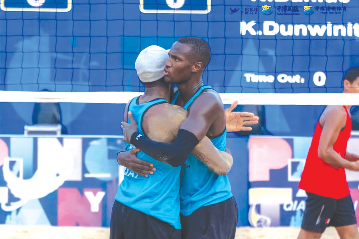 Ahmed Tijan (left) and Cherif Younousse celebrate their victory.