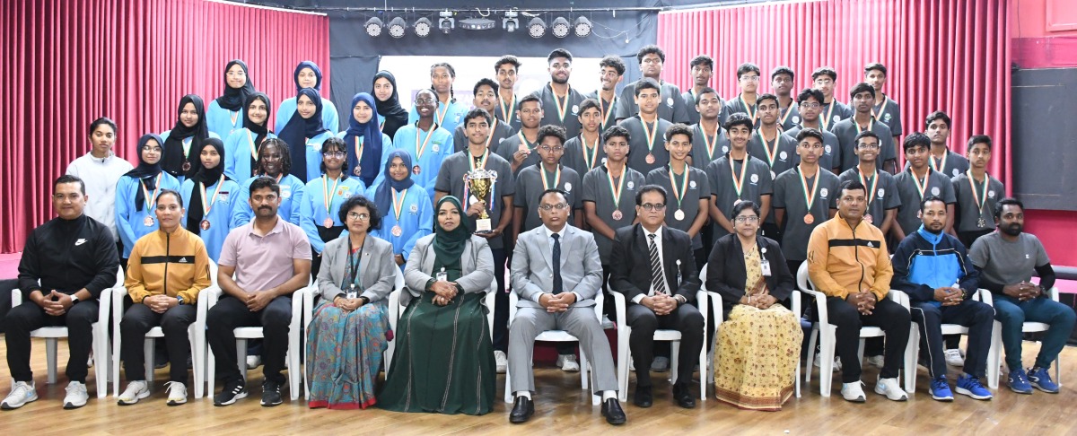 Ideal Indian School officials with members of IIS teams.