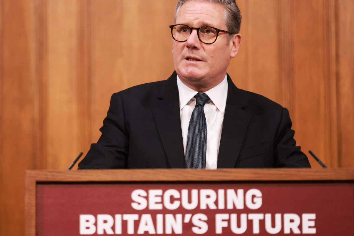 Britain's Prime Minister Keir Starmer delivers a speech during a press conference at the media briefing room of 9 Downing Street, central London, on May 12, 2025 ahead of the publication of the Government's Immigration White Paper. (Photo by Ian Vogler / POOL / AFP)
