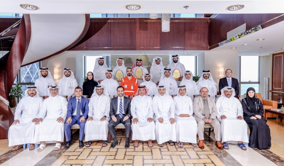 Officials from QatarEnergy LNG and ExxonMobil Qatar during the award ceremony.