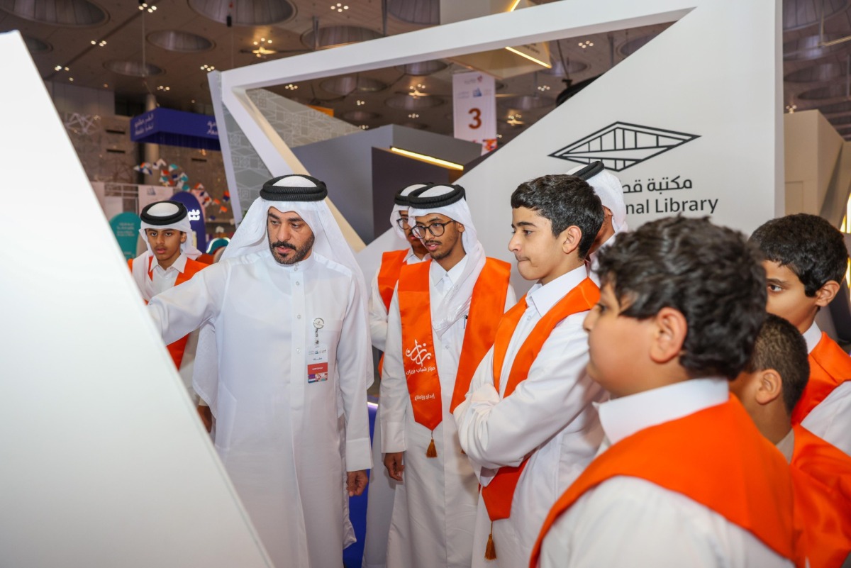 Students visit MECC pavilion at Doha International Book Fair.