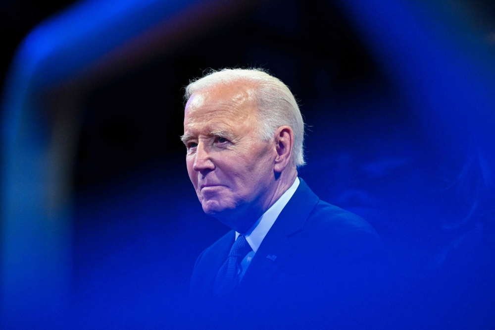 (Files) Former US President Joe Biden attends a Department of Defense Commander in Chief Farewell Ceremony at Joint Base Myers-Henderson Hall in Arlington, Virginia, on January 16, 2025. (Photo by Roberto Schmidt / AFP)