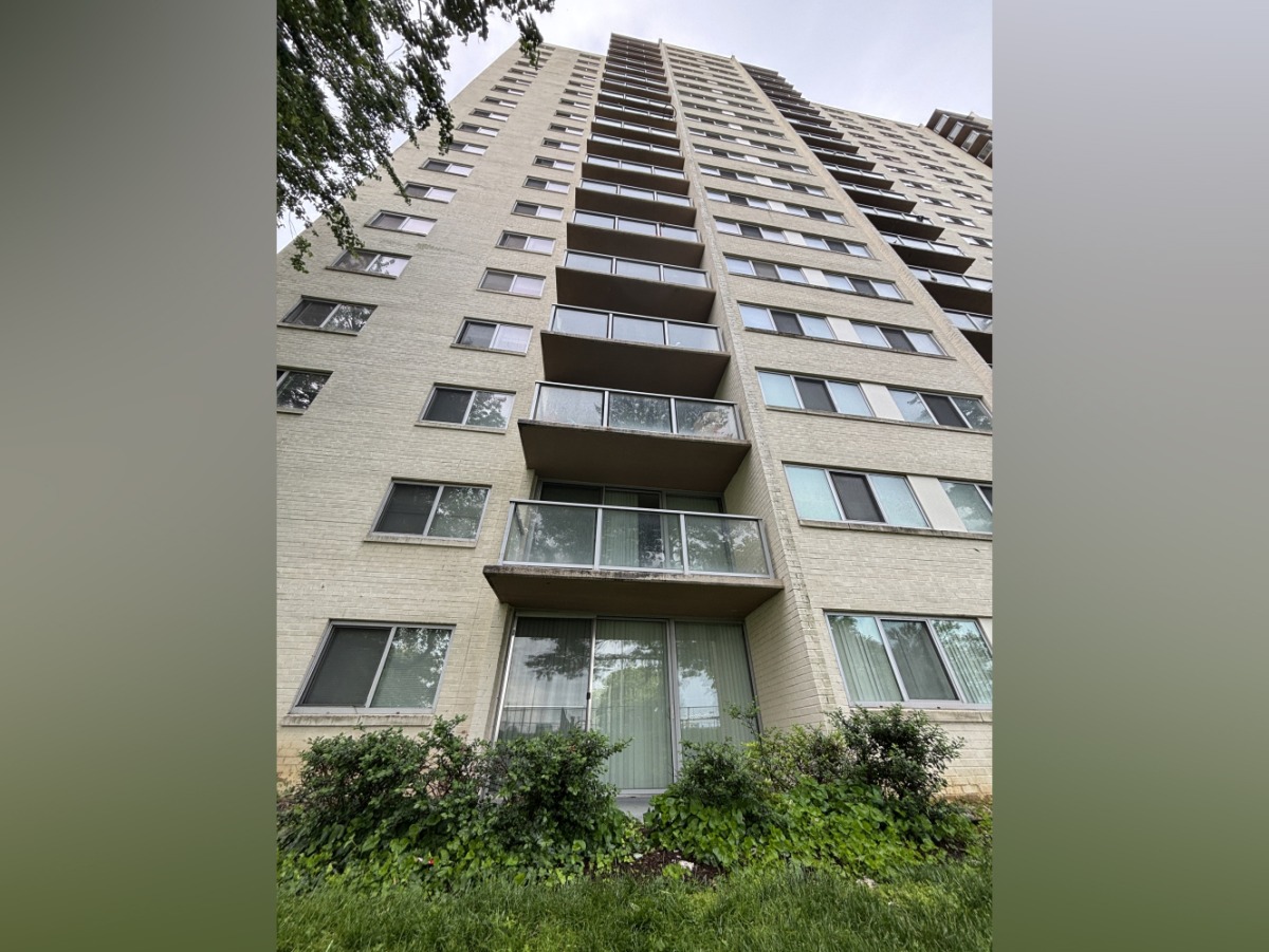 A child fell from a 15th-floor balcony of this apartment building in Montgomery County, Maryland, and landed on a bush and survived, police said. Picture: Dan Morse/The Washington Post