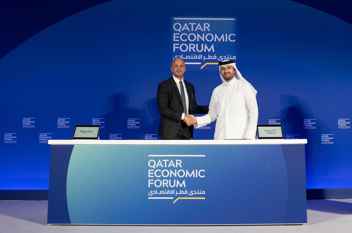 Sheikh Ali Alwaleed Al-Thani, CEO, Invest Qatar with Louie Jarouche, Country Manager for Qatar & Kuwait, Schneider Electric during the signing at Qatar Economic Forum 2025.