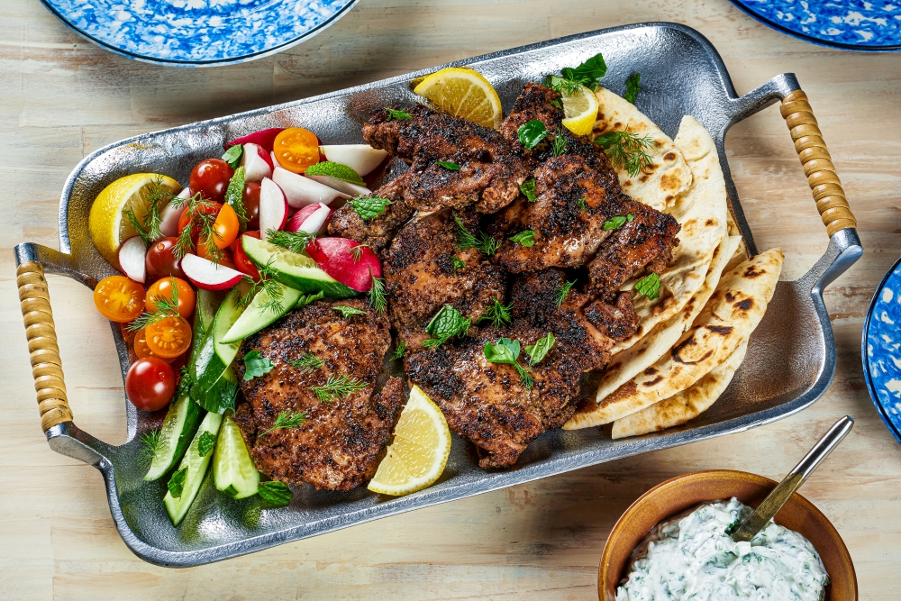 Blistered chicken with Garlic, Urfa Chile and Orange. (Photo by Rey Lopez; food styling by Carolyn Robb/Both for The Washington Post)