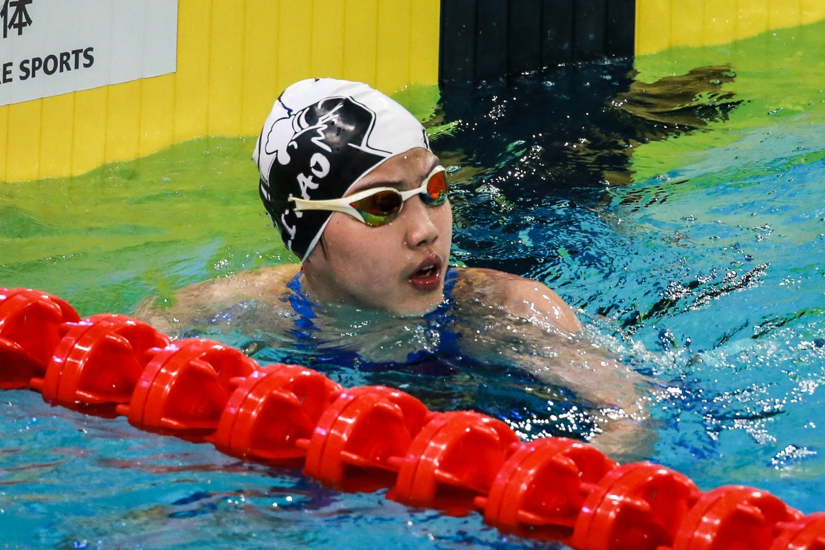 China's Yu Zidi reacts after finishing the women's 200 meters freestyle semifinal at the 2025 National Swimming Championships in Shenzhen on May 19, 2025. (Photo by AFP) 