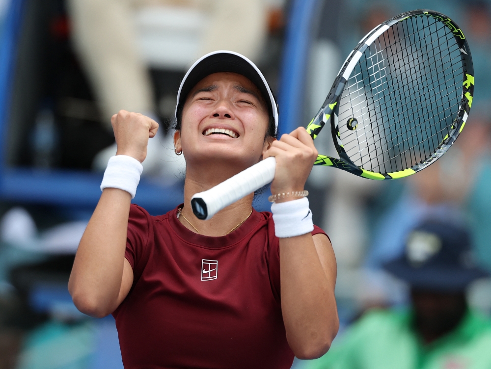 Alexandra Eala of the Philippines reacts at match point after defeating Iga Swiatek of Poland on Day 9 of the Miami Open at Hard Rock Stadium on March 26, 2025 in Miami Gardens, Florida. (Photo by Al Bello/Getty Images via AFP)

