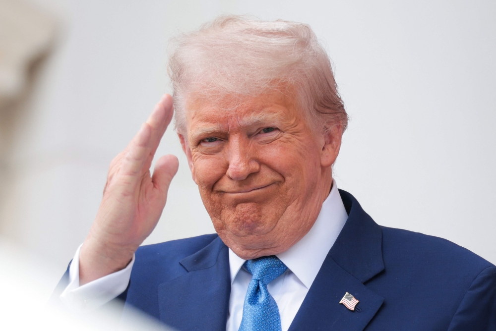 US President Donald Trump speaks during the Memorial Day wreath-laying ceremony at the Memorial Amphitheater in Arlington National Cemetery on May 26, 2025 in Arlington, Virginia. (Photo by Kayla Bartkowski/Getty Images/AFP)