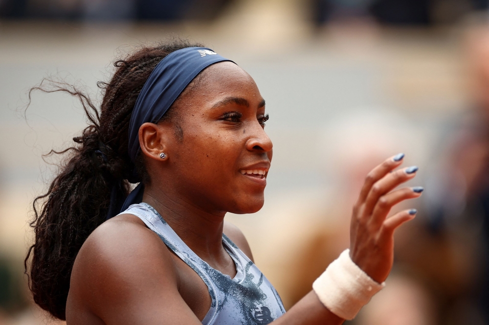 US Coco Gauff reacts during her women's singles match against Australia's Olivia Gadecki on day 3 of the French Open tennis tournament on Court Philippe-Chatrier at the Roland-Garros Complex in Paris on May 27, 2025. (Photo by Franck Fife / AFP)