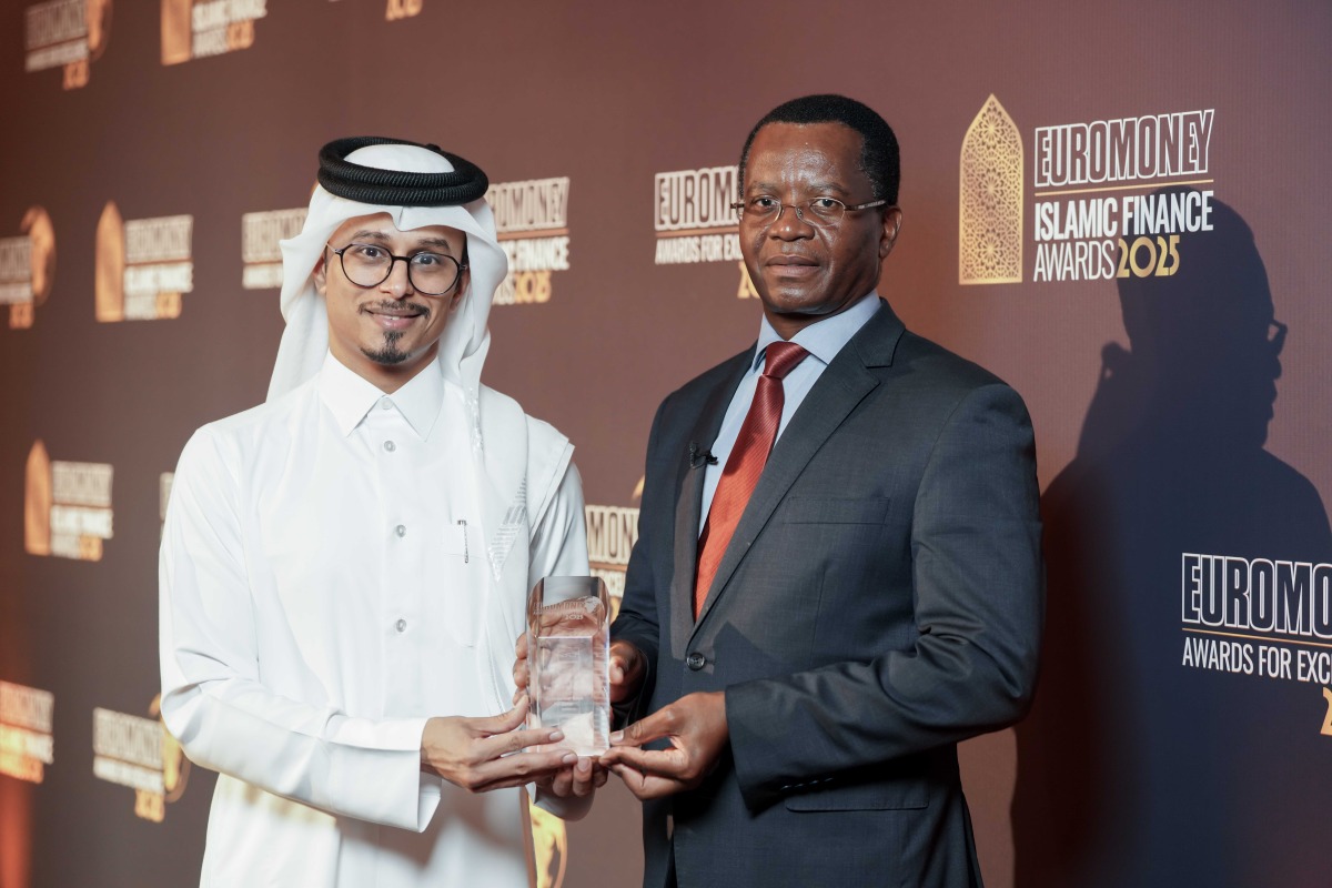 A Commercial Bank official receiving an award.
