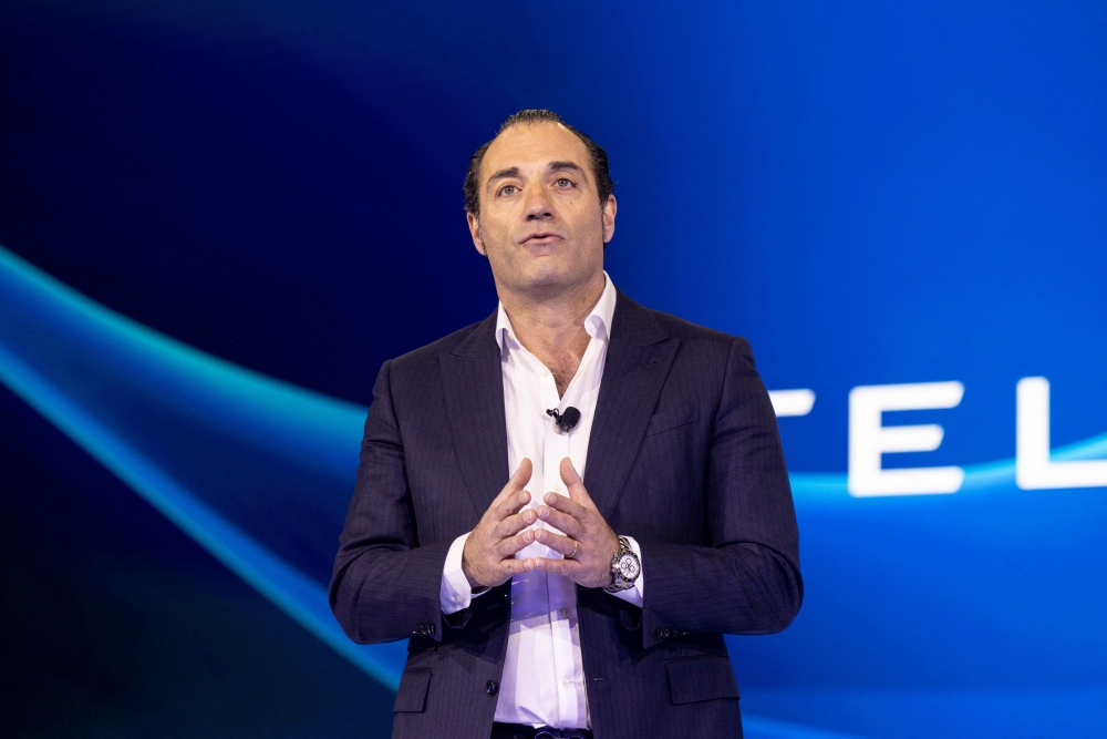 (Files) Stellantis North America COO and Jeep CEO Antonio Filosa speaks during Stellantis press conference in Los Angeles, California, November 21, 2024. (Photo by Etienne Laurent / AFP)