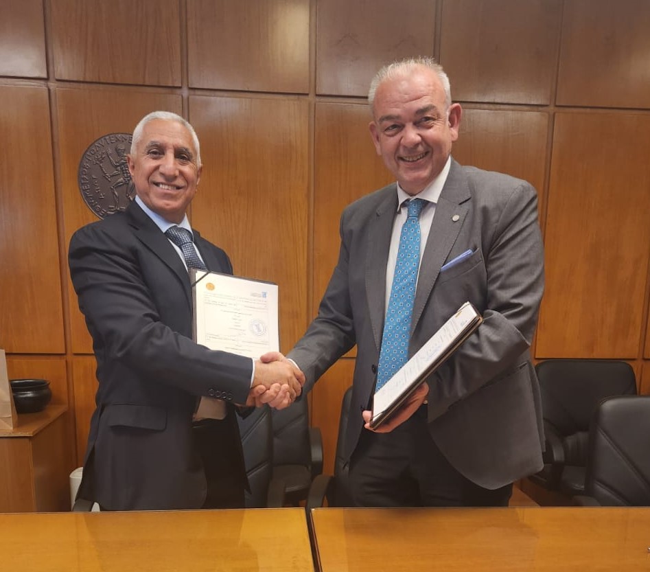 UDST President Dr. Salem Al-Naemi (left) and NTUA Rector Professor Ioannis K Chatjigeorgiou during signing of the agreement.  