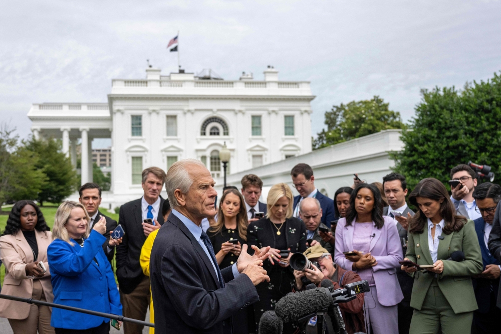 Counselor to the President for Trade and Manufacturing Peter Navarro speaks to the press outside the White House in Washington, DC, on May 29, 2025. (Photo by Jim Watson / AFP)
