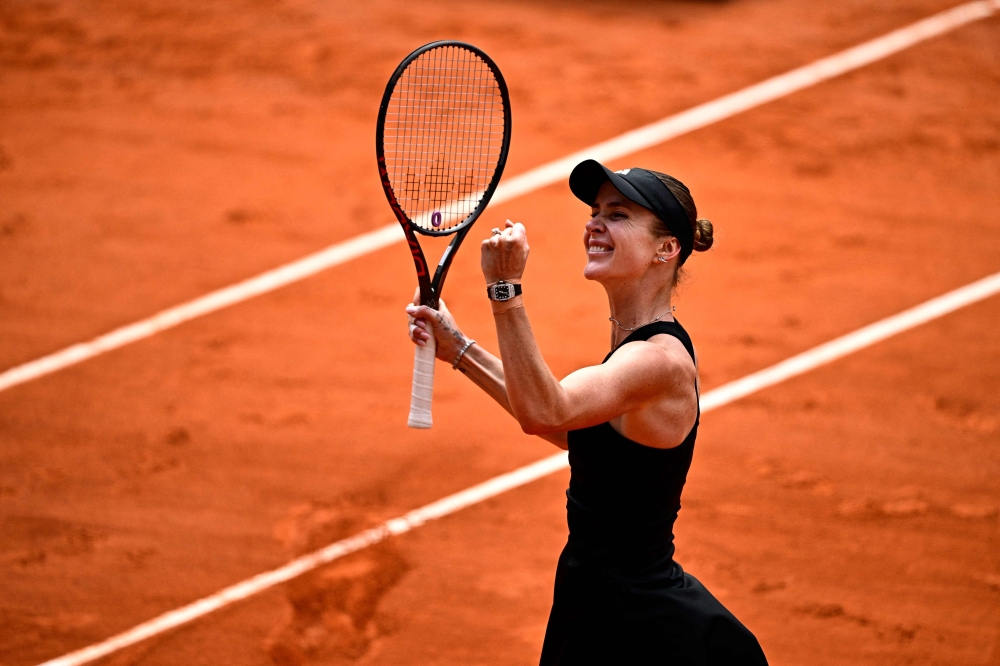 Ukraine's Elina Svitolina celebrates after winning against Italy's Jasmine Paolini at the Roland-Garros Complex in Paris on June 1, 2025. (Photo by Julien De Rosa / AFP)