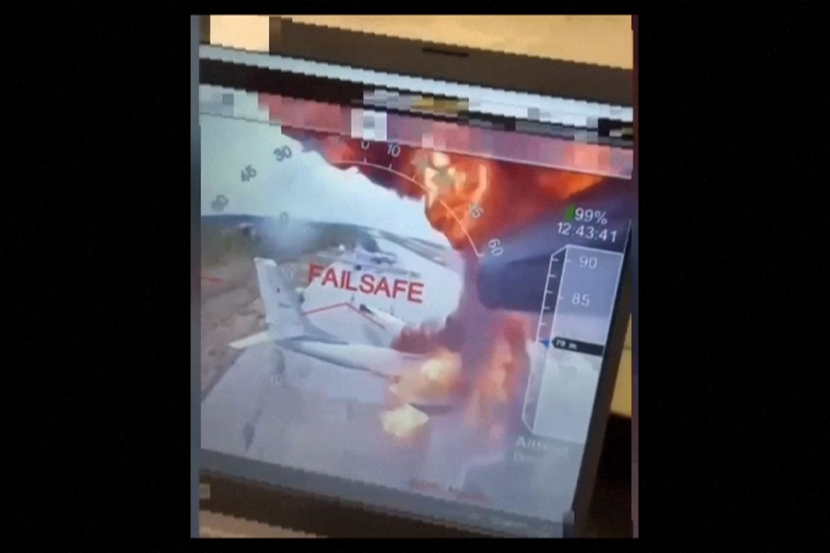 This picture grabed from a video released by the Ukrainian secret services on June 1, 2025 shows what they say are several aircraft on fire on Belaya air base in eastern Siberia, more than 4,200 kilometers from Ukraine, amid the Russian invasion of Ukraine. (Photo by Handout / SECURITY SERVICE OF UKRAINE / AFP)