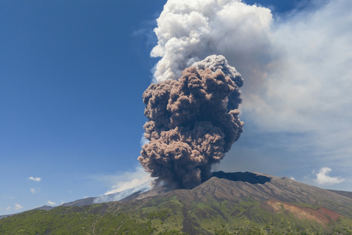 Smoke rises from the crater of the Etna volcano as it erupts, on Mount Etna near Catania on June 2, 2025. Photo by Giuseppe Distefano / AFP.